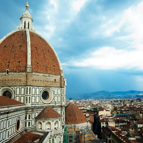 Visit the architectural marvel that is the Cathedral of Santa Maria del Fiore, just a five-minute walk away