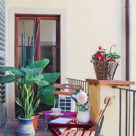 Join the potted plants in absorbing the morning sun from your private balcony