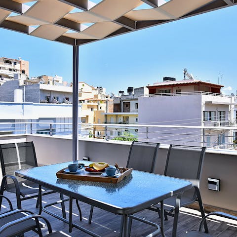 Tuck into olives and local cheese on the balcony as you watch the world go by