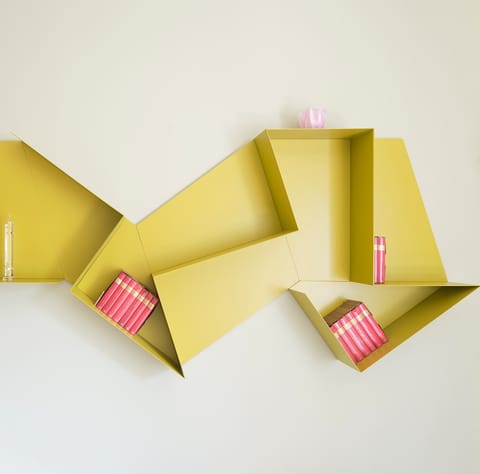 Store your things on the quirky origami shelves