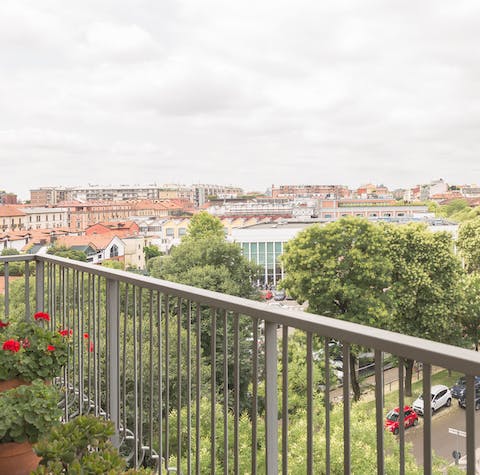Take in skyline views over Milan from your private balcony