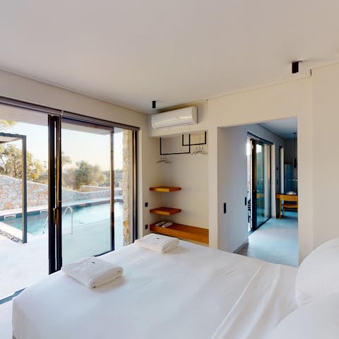 Enjoy instant access out onto the pool deck from the main bedroom