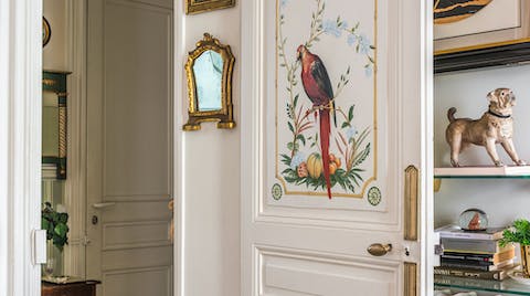 Admire hand-painted details on the walls and doors