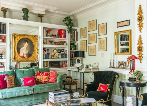 Take in the assortment of antique pieces as you sink into velvet furnishings