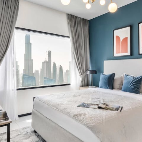 Wake up to incredible views of the skyline, and watch it light up at night