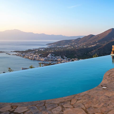 Take in the stunning seascape from the infinity swimming pool 