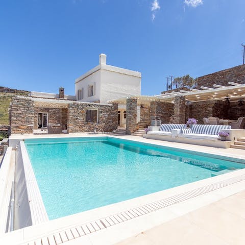 Take a dip in the inviting waters of the pool before drying off in the sun