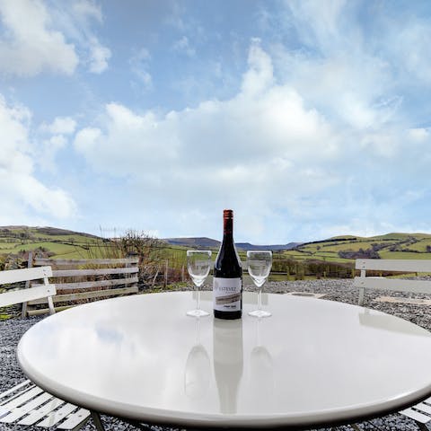 Grab a well-deserved drink outside and admire the countryside views