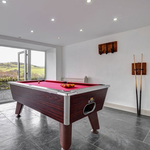Practice your pool skills in the stunning games room 