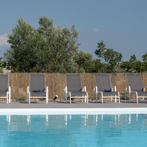 Spend idyllic days lounging by the pool or make your way to the nearby beach