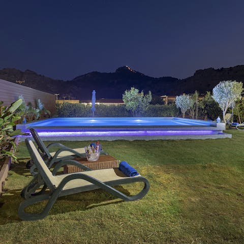 Enjoy a moon-lit swim in the pool