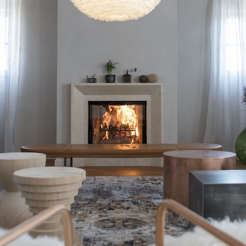 Snuggle up next to one of the home's fireplaces once the sun goes down