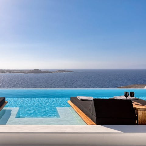 Relax with a book while the Aegean Sea stretches out before you