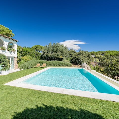 Dive into your private pool to stay cool in the Sardinian sun