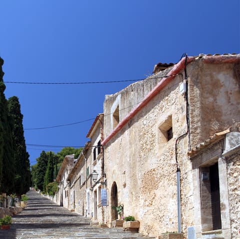 Wander through Pollença town's ancient streets