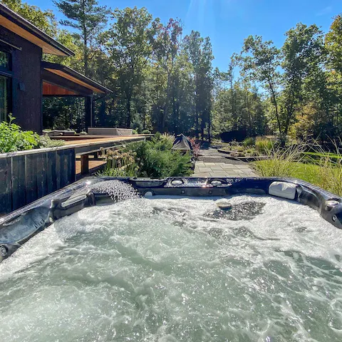 Stargaze from the hot tub surrounded by trees