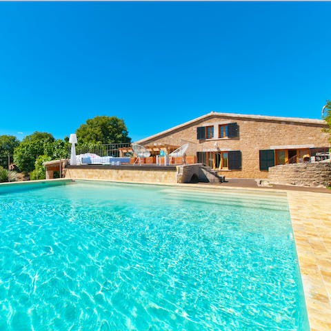 Cool down in the property's large private pool