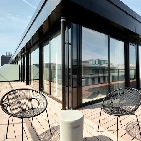 Enjoy sunset drinks on your private rooftop terrace