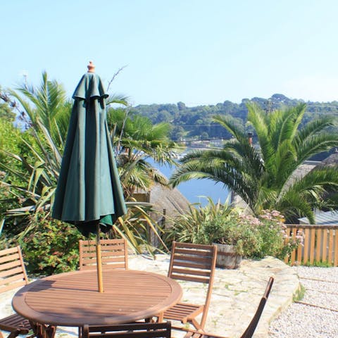 Enjoy elevenses on your patio overlooking the Helford River