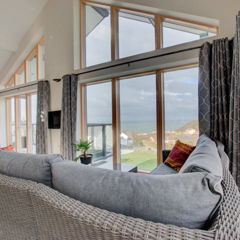 Gaze out at blissful views of the Ceredigion coastline from the large windows