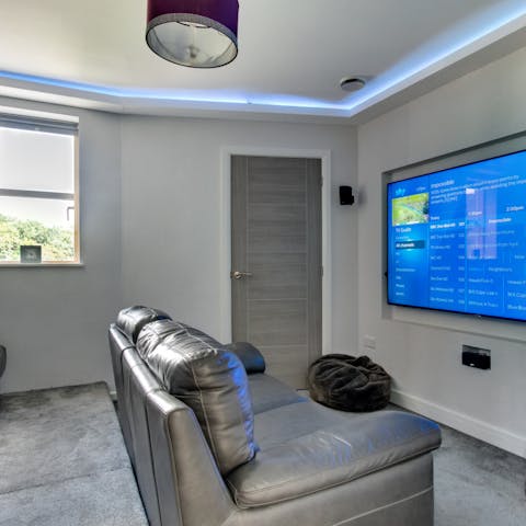 Watch the rugby together in the home's very own cinema room