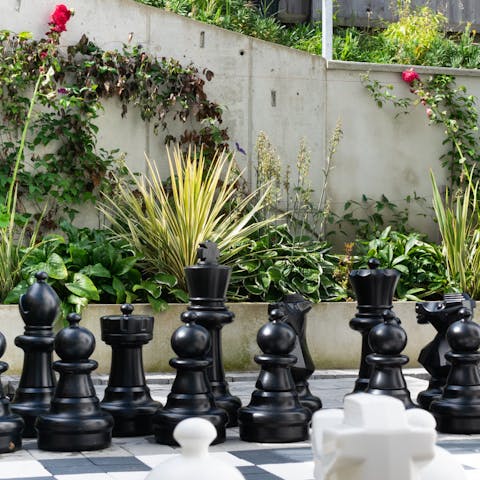 Put a fellow guest in checkmate on the outdoor chess set