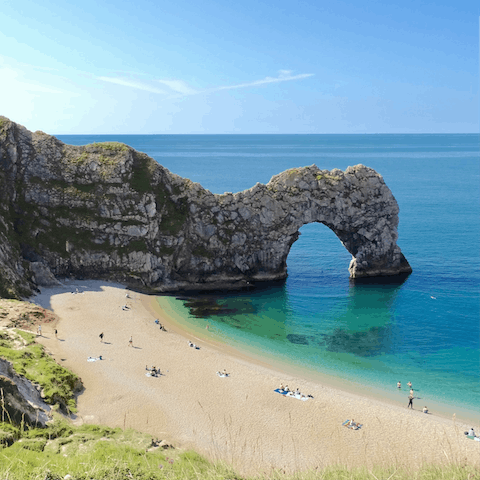Take a forty-five minute drive to visit the striking Durdle Door