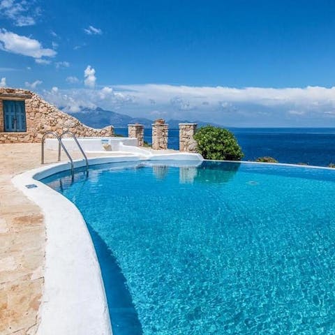 Splash about in the infinity pool and gaze out at the Ionian Sea