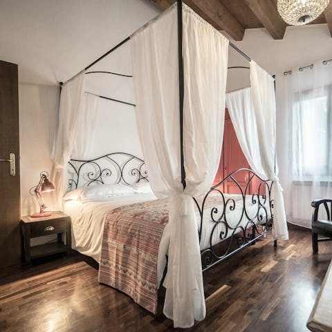 Sleep soundly in the elegant four poster bed