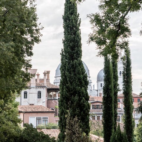 Nurse a coffee as you gaze across the Guggenheim Foundation Museum's gardens from your window