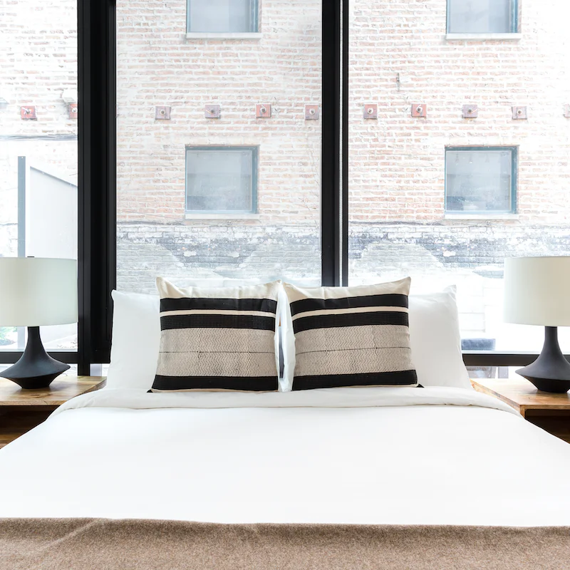 Wake up in the window-framed bedroom feeling rested and ready for another day of exploring