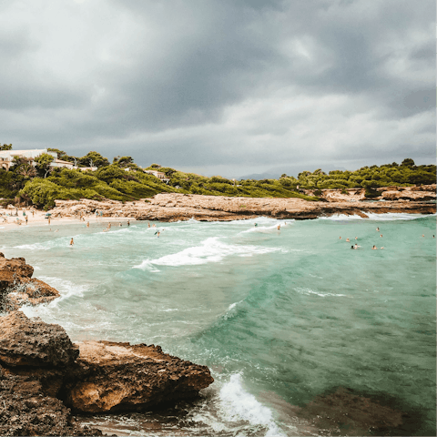 Swim in the sea at Alcudia beach – it's a short drive away
