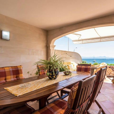 Dine on the terrace and watch the sun begin to set