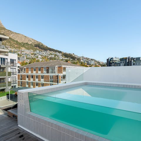 Take a dip in the shared pool while gazing up at Table Mountain