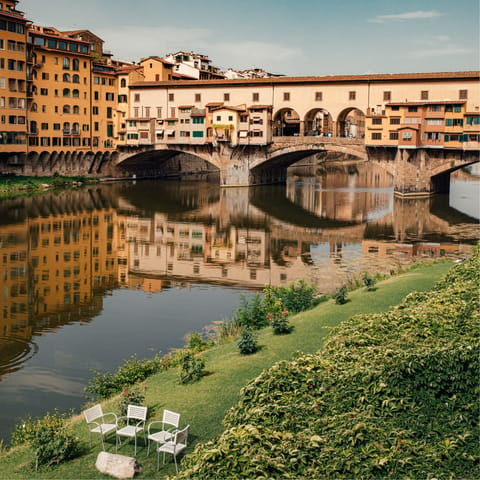 Take an early evening passeggiata over Ponte Vecchio  –⁠ it’s just a one minute stroll away