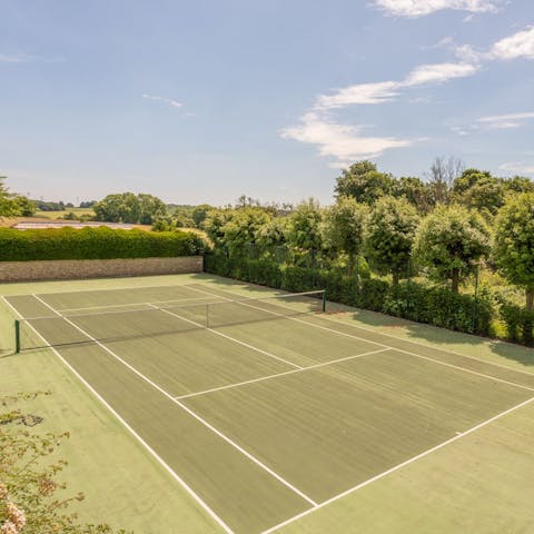 Have a round of tennis at the on-site courts 