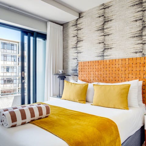 Come home after days spent exploring Cape Town and cosy up in one of the plush double beds