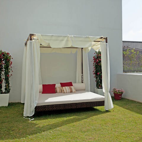Head out to the day bed for a snooze in the sunshine
