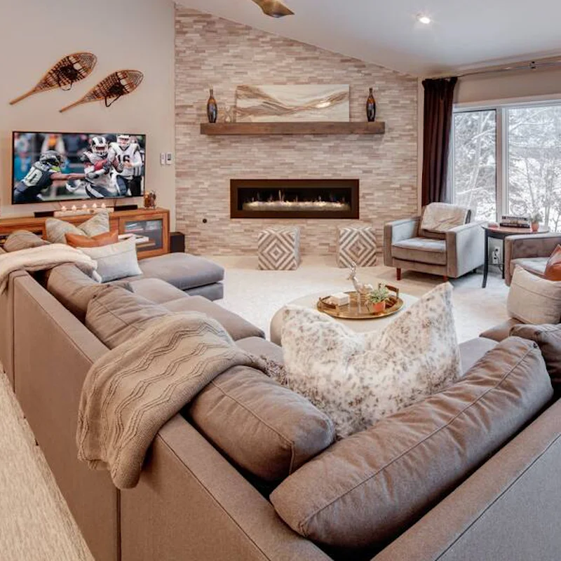 Cosy up by the fireplace in this contemporary room