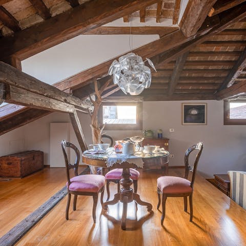 Sit down to an elegant meal in the raised dining area