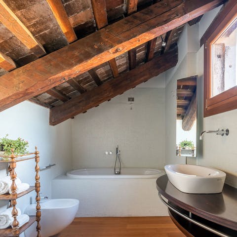 Treat yourself to a long soak in the tub after a busy day touring Venice
