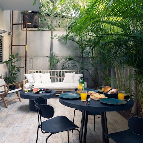 Sit out amidst the lush greenery of your private terrace