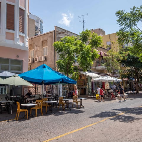 Explore the pavement cafés and street stalls of Nachalat Binyamin, a two-minute walk away