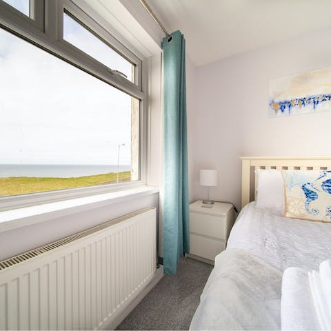 Drink in the sea views with morning cuppas in bed