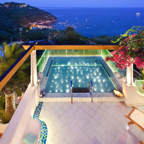 Admire views over the pool and coast from your window