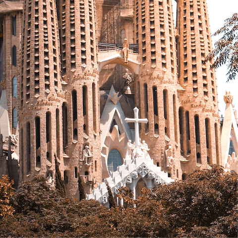  Admire the stunning architecture of La Sagrada Familia – a seventeen–minute walk away
