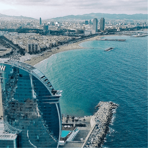 Enjoy Barcelona’s laid back coastal atmosphere and walk along the seafront – a seventeen–minutes away