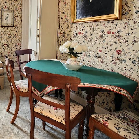 Gather around the dining table to tuck into croissants bought from the local bakery