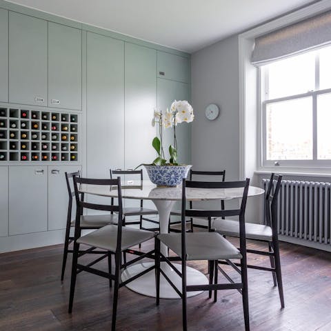 Gather together for sunny breakfasts at the kitchen's chic dining nook