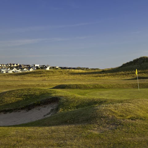 Try out a spot of golf with a view at Llangefni Golf Course and Driving Range – only 5 miles away  